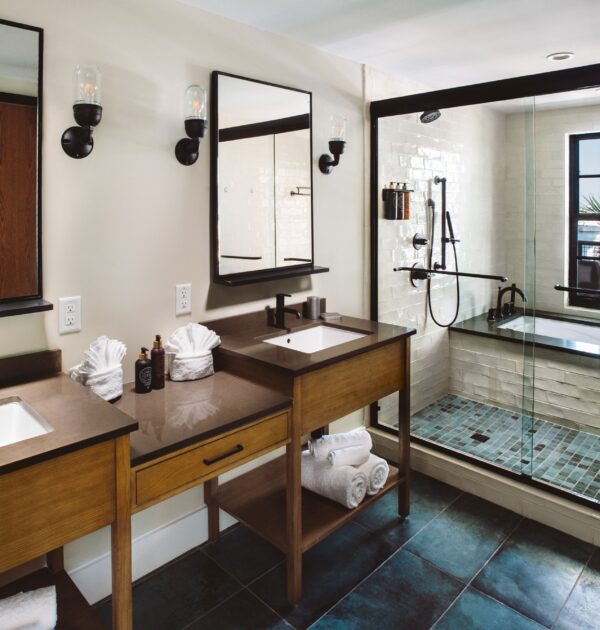 Grand Suite bathroom with shower and window with natural light