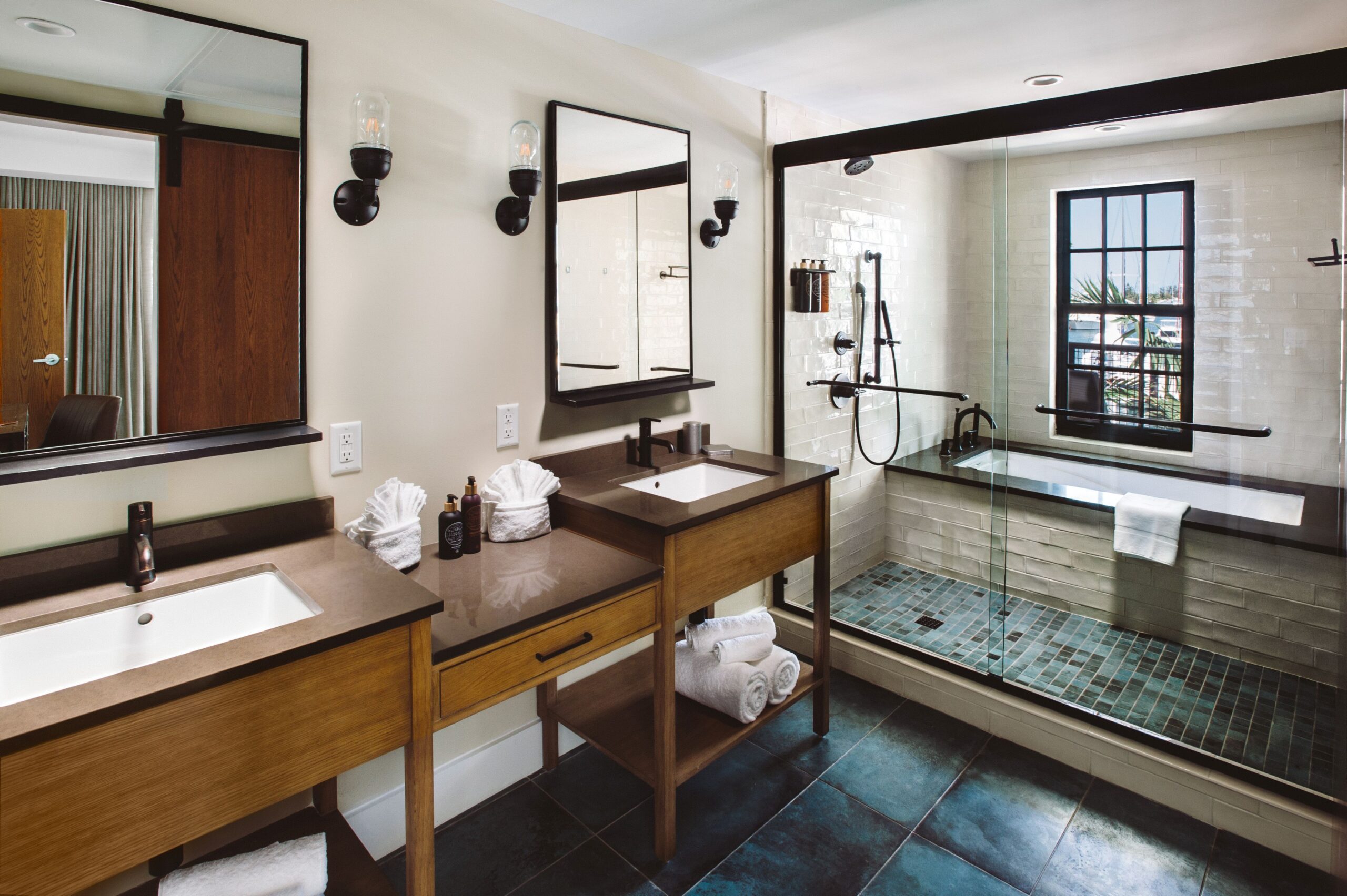 Grand Suite bathroom with shower and window with natural light