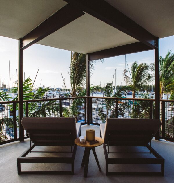 Grand Suite Patio with two lounge chairs overlooking the Marina